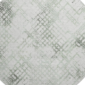 HomeRoots 8' Green and Ivory Abstract Geometric Round Rug - Washable, UV-Protected, and Perfect for Any Space 666647