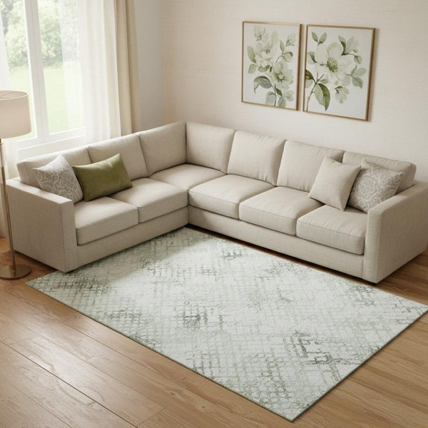 HomeRoots 10' Green and Ivory Abstract Geometric Washable Area Rug with UV Protection for High-Traffic Spaces 666650