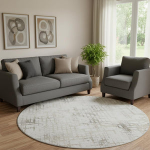 HomeRoots 8' Taupe and Ivory Abstract Geometric Round Rug – Washable & UV Protected for Modern Spaces 666659
