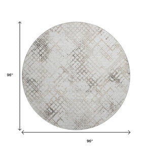 HomeRoots 8' Taupe and Ivory Abstract Geometric Round Rug – Washable & UV Protected for Modern Spaces 666659