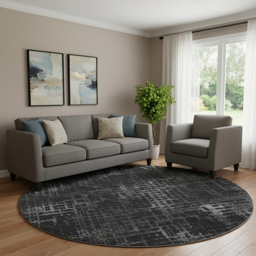 HomeRoots 8' Charcoal and Ivory Abstract Geometric Round Rug – Stylish, Washable, UV-Protected & Durable Design 666671