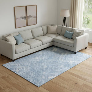 HomeRoots 10' Sky Blue and Ivory Abstract Geometric Area Rug - Washable, Durable, UV-Protected for Modern Spaces 666704