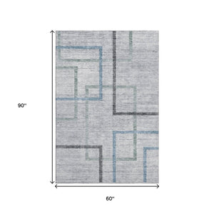 HomeRoots 5' X 8' Gray and Blue Geometric Washable Area Rug - Stylish, Durable, UV Protected for Any Space! 666708