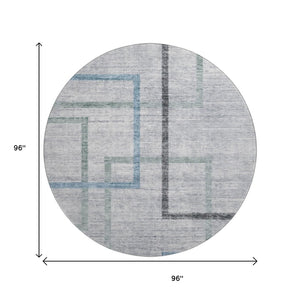 HomeRoots 8' Gray and Blue Geometric Round Rug - Washable, UV-Protected, Durable for High-Traffic Areas 666709
