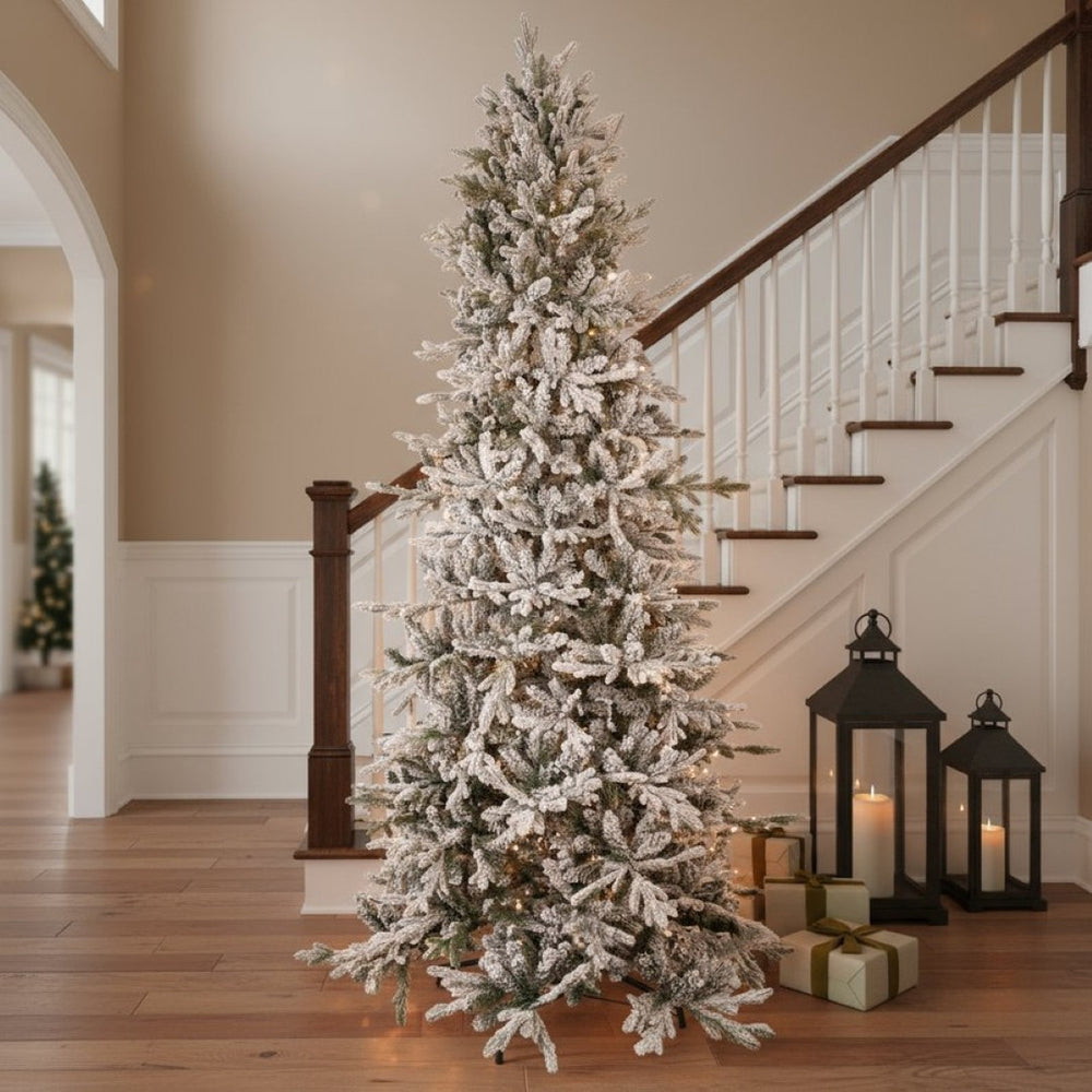 HomeRoots 8' Elegant Slender Flocked Pine Christmas Tree - Perfect for Compact Spaces with Realistic Snow Finish 666718