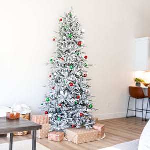 HomeRoots 8' Elegant Slender Flocked Pine Christmas Tree - Perfect for Compact Spaces with Realistic Snow Finish 666718