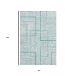 HomeRoots 5' X 8' Teal and Ivory Geometric Area Rug - Washable, UV-Protected, Stain-Resistant Design for Homes 666761