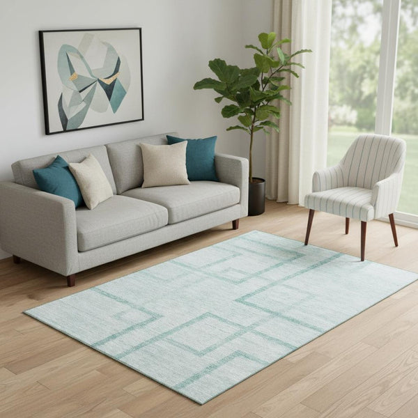 HomeRoots 5' X 8' Teal and Ivory Geometric Area Rug - Washable, UV-Protected, Stain-Resistant Design for Homes 666761