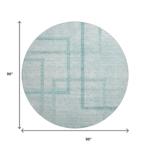 HomeRoots 8' Teal and Ivory Geometric Round Rug - Washable, UV Protected, Stylish for Living Rooms & Patios 666762