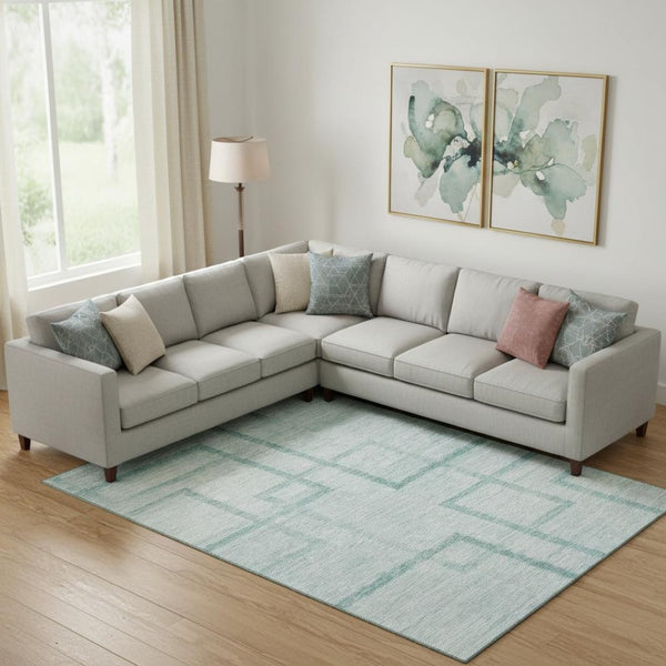 HomeRoots 8' X 10' Geometric Teal and Ivory Area Rug - Washable, UV Protected, Stain-Resistant for Modern Homes 666763