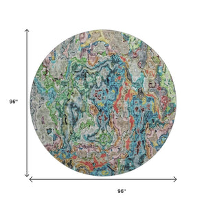 HomeRoots 8' Vibrant Blue Orange Green Abstract Round Rug – Washable, UV Protected, Ideal for Modern Spaces 666792