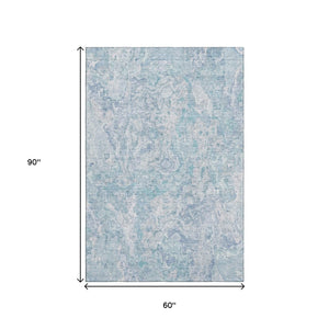 HomeRoots 5' X 8' Sky Blue & Ivory Abstract Washable Area Rug - Soft, Stylish, UV-Protected for Every Space! 666821