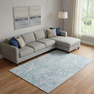 HomeRoots 9' Sky Blue and Ivory Abstract Area Rug - Washable, UV Protected, Perfect for Kids and Pets! 666824
