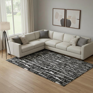 HomeRoots 8' X 10' Black and Ivory Vermicular Area Rug – Washable, UV Protected, Stylish for Homes with Kids & Pets 666840