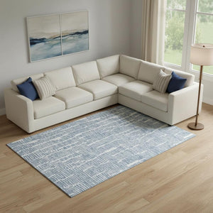 HomeRoots 9' X 12' Blue and Ivory Vermicular Area Rug - Washable, UV-Protected, Stain-Resistant, Durable Design 666847