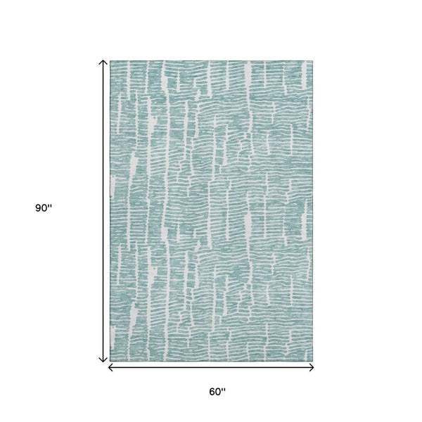 HomeRoots 5' X 8' Teal and Ivory Washable Area Rug with UV Protection - Soft, Durable, Stylish for Every Home 666862