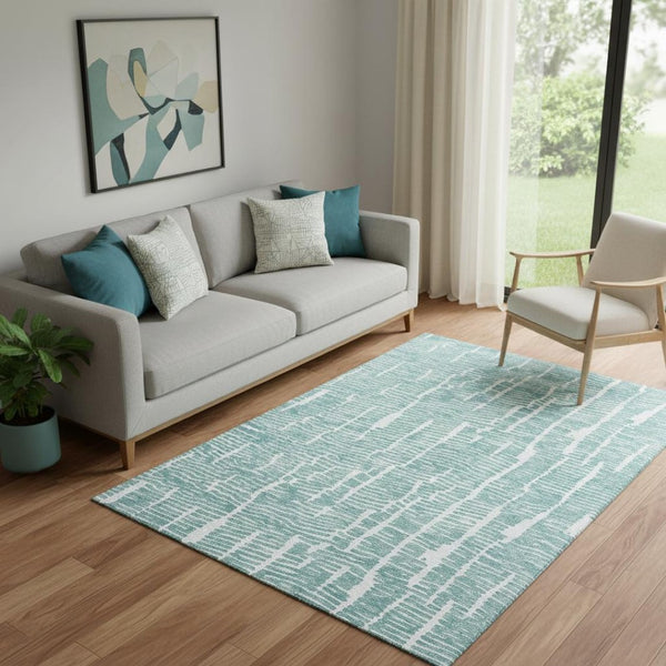 HomeRoots 5' X 8' Teal and Ivory Washable Area Rug with UV Protection - Soft, Durable, Stylish for Every Home 666862