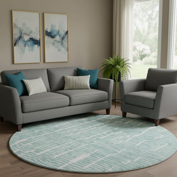 HomeRoots 8' Teal and Ivory Vermicular Round Rug - Washable, UV-Protected, Durable for High-Traffic Spaces 666863