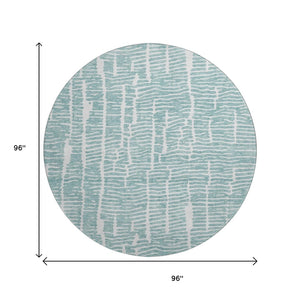 HomeRoots 8' Teal and Ivory Vermicular Round Rug - Washable, UV-Protected, Durable for High-Traffic Spaces 666863