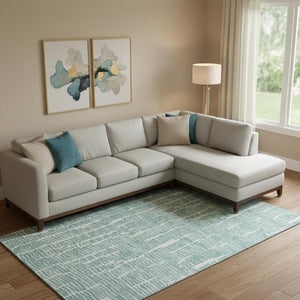 HomeRoots 9' X 12' Teal and Ivory Washable Area Rug with UV Protection - Durable, Stylish & Easy to Clean! 666865