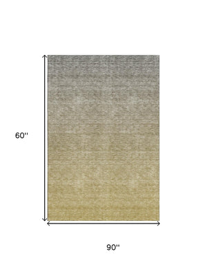 HomeRoots 10' X 14' Gold & Beige Ombre Area Rug - Stylish, Washable, UV-Protected for Kids & Pets in Your Home 666908
