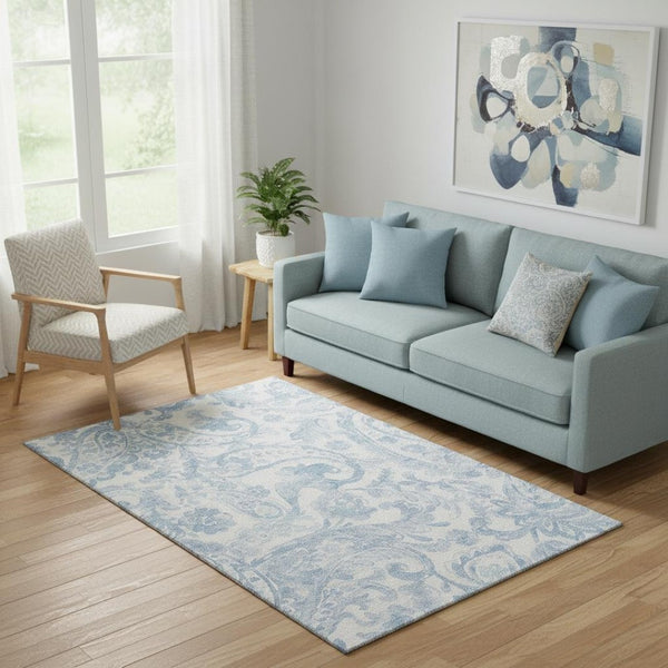 HomeRoots 5' X 8' Sky Blue Paisley Area Rug - Washable, UV Protected, Durable, and Stylish for Any Space 667008