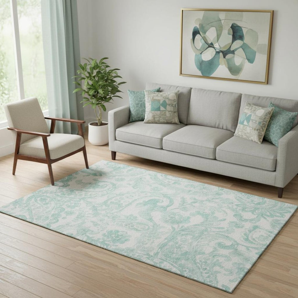 HomeRoots 5' X 8' Turquoise & Ivory Paisley Area Rug - Stylish, Durable, Stain-Resistant, UV-Protected Floor Covering 667014
