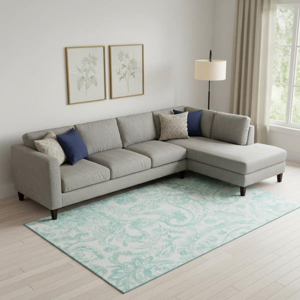 HomeRoots 9' X 12' Turquoise and Ivory Paisley Area Rug - Durable, Washable, UV-Protected for Stylish Living Spaces 667017