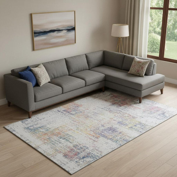 HomeRoots 10' X 14' Ivory Blue Gold Abstract Area Rug – Washable, Stain-Resistant, UV-Protected for Modern Homes 667102