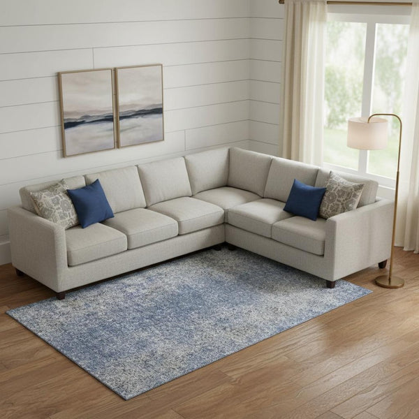 HomeRoots 9' X 12' Stylish Blue and Gray Washable Area Rug with UV Protection for High-Traffic Spaces 667161