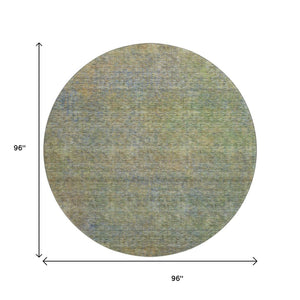 HomeRoots 8' Green And Gold Abstract Washable Round Rug - UV Protected, Stain-Resistant, Ideal for Busy Homes 667297