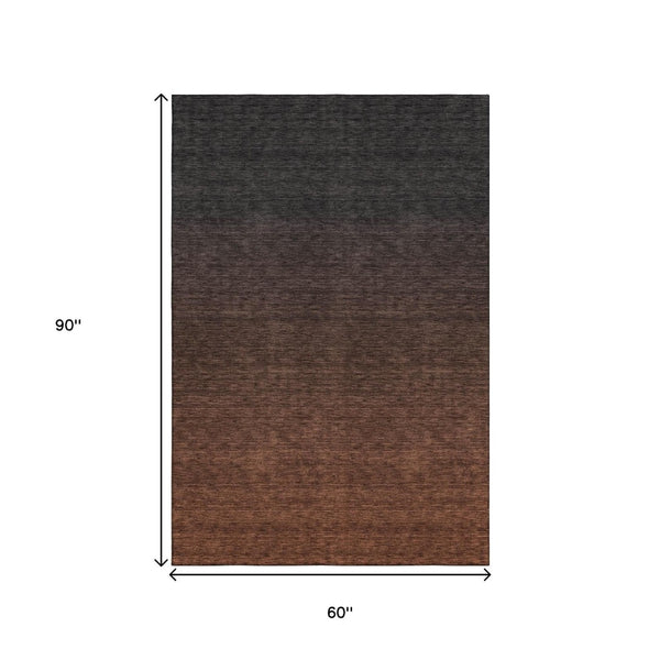 HomeRoots 5' X 8' Ombre Area Rug in Rust & Charcoal - Durable, Washable, UV-Protected for Stylish Living Spaces 667338