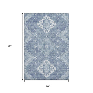 HomeRoots 5' X 8' Blue and Ivory Medallion Area Rug – Stylish, Washable, UV-Protected for Everyday Living Spaces 667404