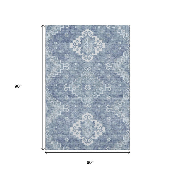 HomeRoots 5' X 8' Blue and Ivory Medallion Area Rug – Stylish, Washable, UV-Protected for Everyday Living Spaces 667404