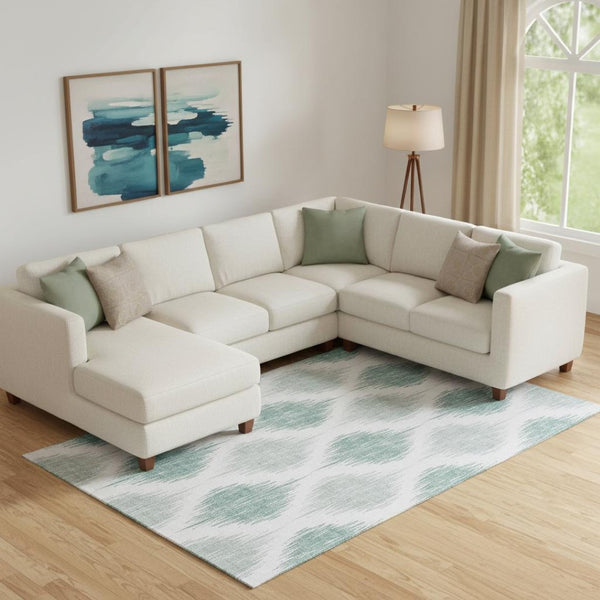 HomeRoots 8' X 10' Aqua And Ivory Ikat Area Rug – Stylish, Washable, UV-Protected for High-Traffic Spaces! 667447