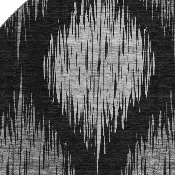 HomeRoots 8' Black and Ivory Ikat Washable Round Rug - Durable, UV Protected, Perfect for High-Traffic Homes 667452