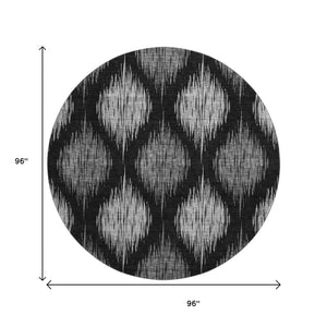 HomeRoots 8' Black and Ivory Ikat Washable Round Rug - Durable, UV Protected, Perfect for High-Traffic Homes 667452