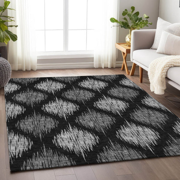 HomeRoots 9' X 12' Ikat Area Rug in Black and Ivory - Stylish, Washable, Stain Resistant with UV Protection 667454