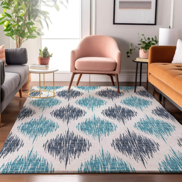 HomeRoots 5' Blue and Ivory Ikat Area Rug - Washable, UV Protected, Stain Resistant for High-Traffic Spaces 667457