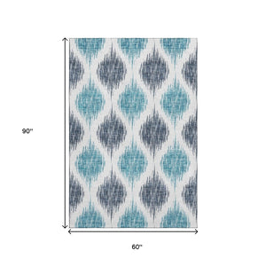 HomeRoots 5' Blue and Ivory Ikat Area Rug - Washable, UV Protected, Stain Resistant for High-Traffic Spaces 667457