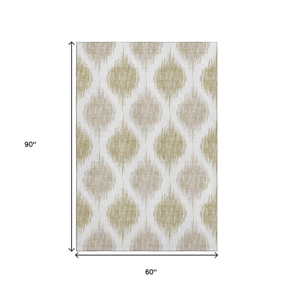 HomeRoots 5' X 8' Ikat Area Rug in Gold & Ivory - Stylish, Washable, UV-Protected for Busy Homes & Easy Care 667475