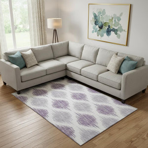 HomeRoots 9' X 12' Stylish Lavender & Ivory Ikat Area Rug - Washable, UV Protected, Perfect for High-Traffic Spaces 667490