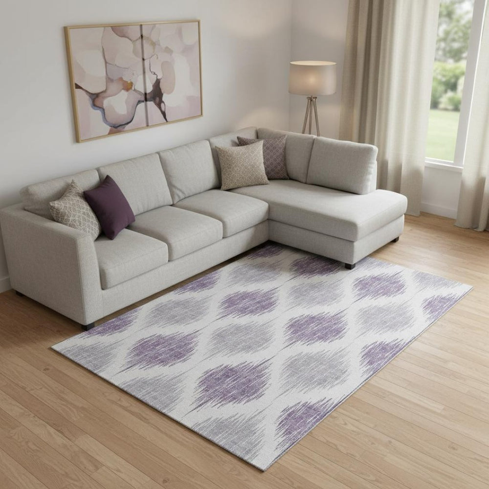 HomeRoots 10' X 14' Ikat Area Rug in Lavender & Ivory - Washable, Durable, UV-Protected for Family Spaces 667491