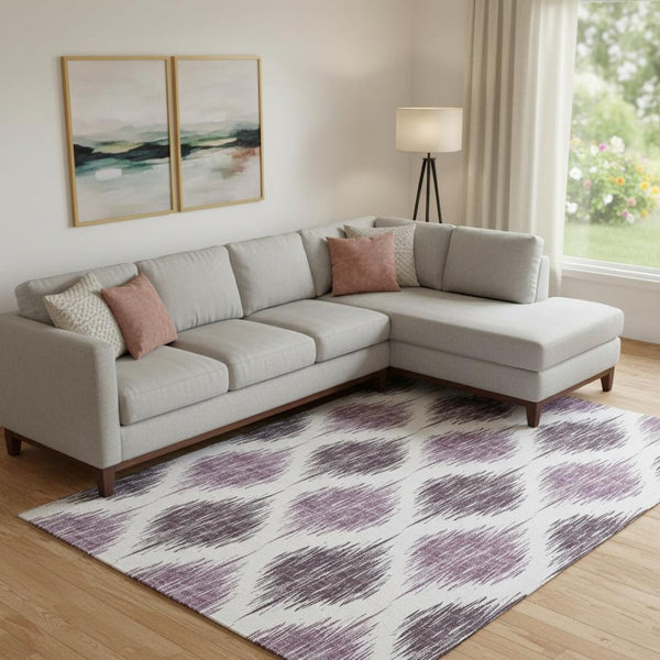 HomeRoots 10' Purple and Ivory Ikat Area Rug - Washable, UV-Protected, Durable Design for High-Traffic Spaces 667497