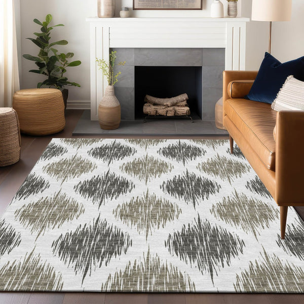 HomeRoots 10' X 14' Taupe and Ivory Ikat Area Rug - Durable, Washable with UV Protection for Family Spaces 667509