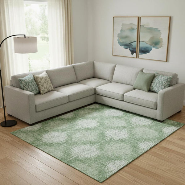 HomeRoots 9' X 12' Mint Green & Ivory Ikat Area Rug - Washable, UV Protected, Durable for Family Spaces 667538