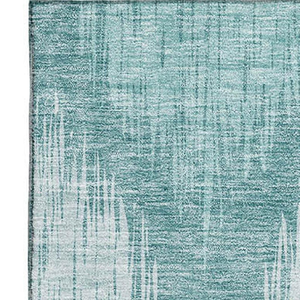 HomeRoots 9' X 12' Teal And Ivory Ikat Area Rug - Stylish, Washable, UV-Protected for Everyday Family Living 667556