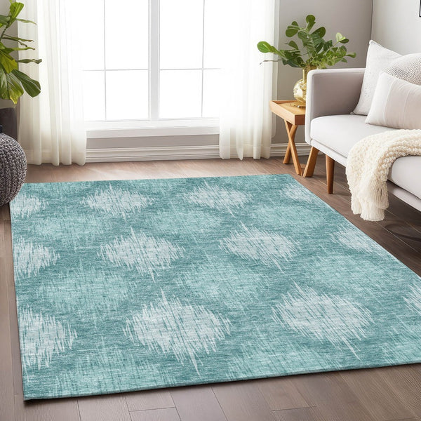 HomeRoots 10' X 14' Teal & Ivory Ikat Area Rug - Washable, UV-Protected, Stylish & Stain-Resistant Design! 667557