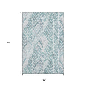 HomeRoots 5' X 8' Aqua & Ivory Geometric Area Rug - Durable, Washable, UV-Protected for Modern Spaces 667577