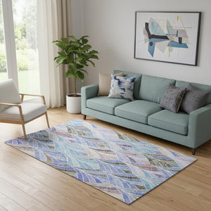 HomeRoots 5' X 8' Geometric Area Rug in Blue, Brown & Blush - Washable, UV-Protected & Kid-Friendly Design 667583